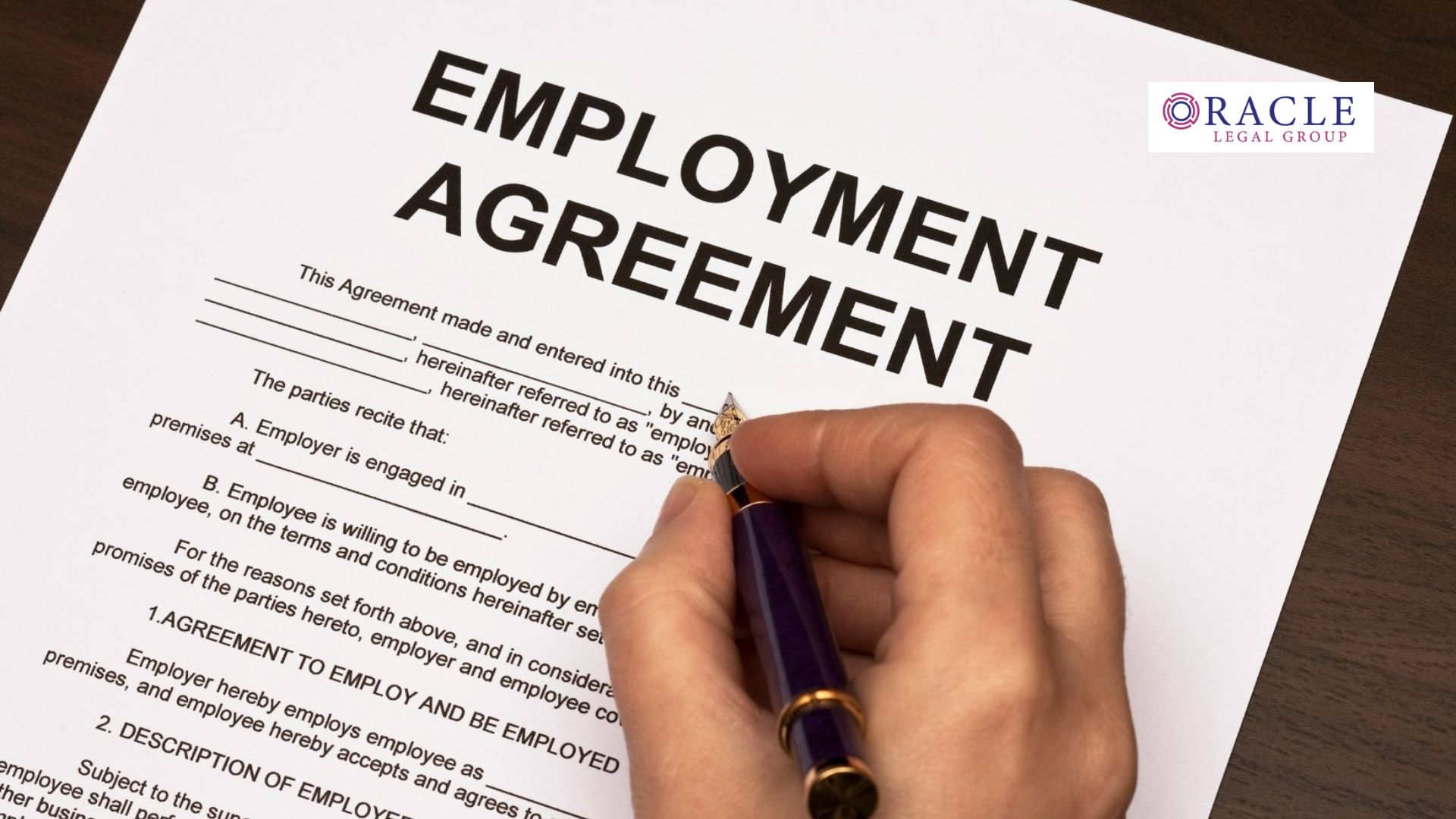 Close-up of a hand holding a fountain pen, signing an employment agreement document; Oracle Legal Group logo in the corner, symbolizing formalization of workplace terms and legal compliance
